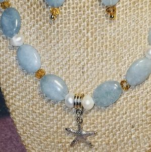 Set, genuine stones necklace and earrings